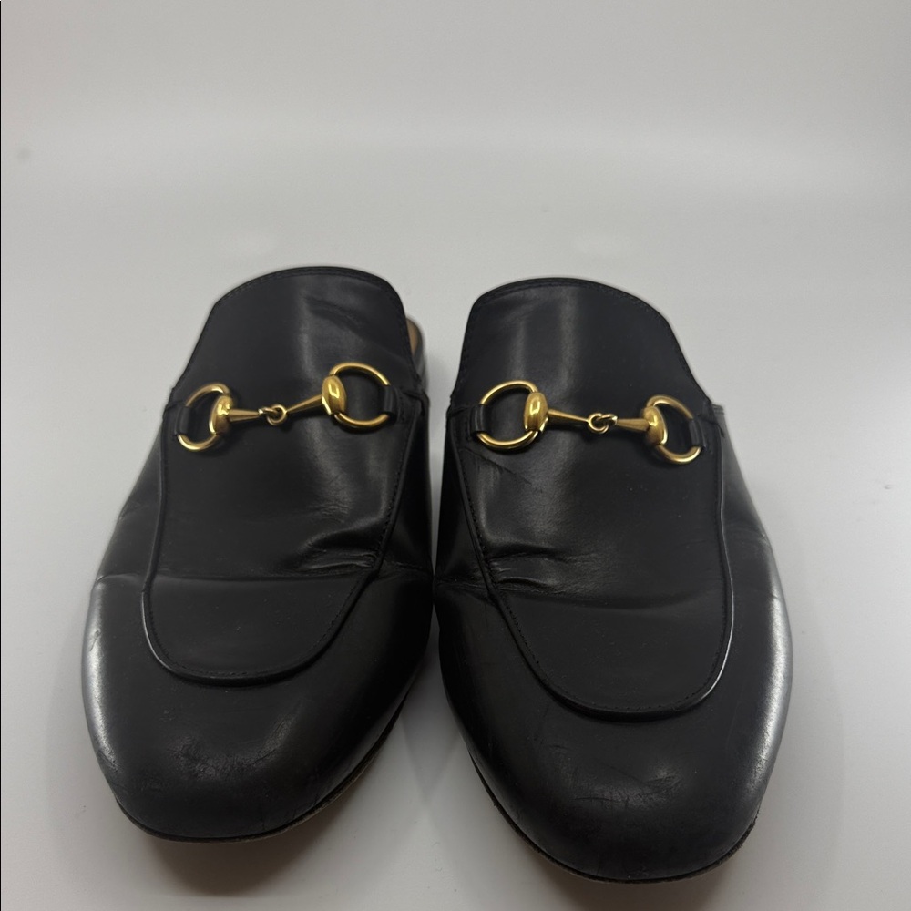Gucci Black Leather Loafers with Gold Detailing